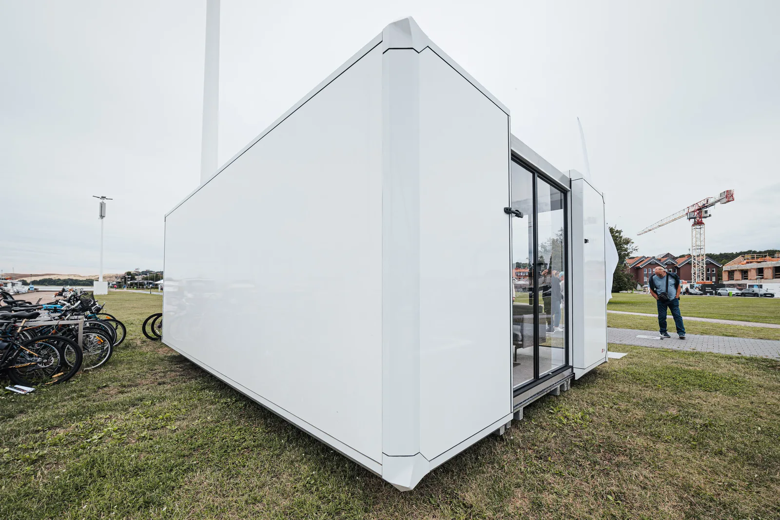 The module closed, a white shell on the grass